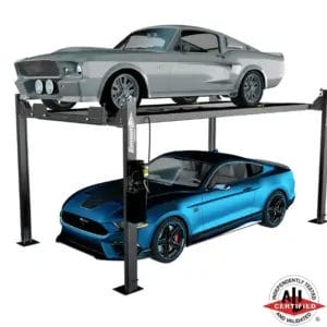 Classic silver Mustang above a modern blue Mustang on a Forward Lift EFP8 four-post lift, ALI certified